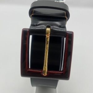 black cordovan belt with lacquered buckle